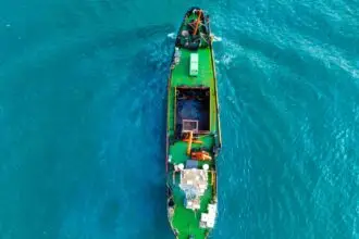 drone shot of a ship on a sea